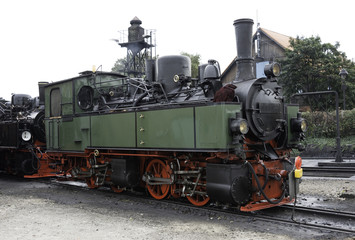 Fototapeta na wymiar old green steam train in germany