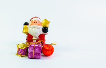 Santa claus doll with gift boxes toy on white background