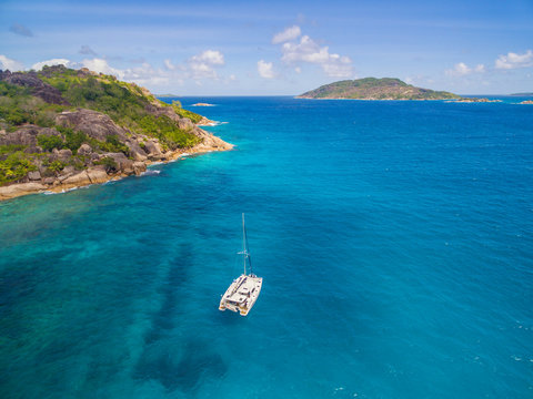 Aerial view of catamaran sailling in coastline