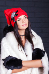 beautiful young woman standing in a hat, cap with bubo, happy, m
