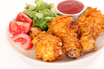 fried chicken with salad and tomato