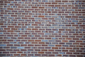 Red and blue brick wall background