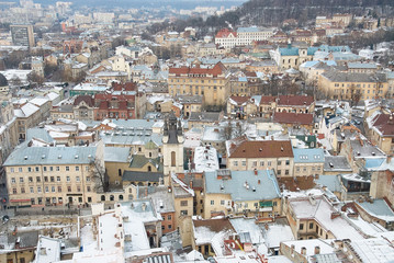 Fototapeta na wymiar Winter view on the downtown in Lviv, Ukraine.