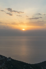 View from the top of the hill towards sea at sunset 3