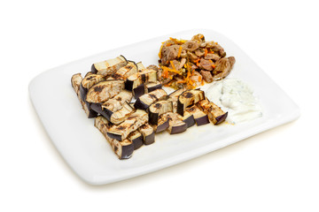 Platter of grilled eggplant with tzatziki sauce