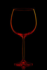 Silhouette of red wine glass with clipping path on black background.