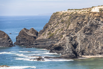 Fototapeta na wymiar Rocky coast of Odeceixe in Algarve region, Portugal