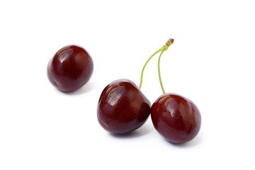 Tasty ripe cherries isolated with white background
