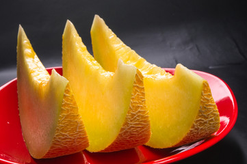 Fototapeta na wymiar slices of ripe juicy melon