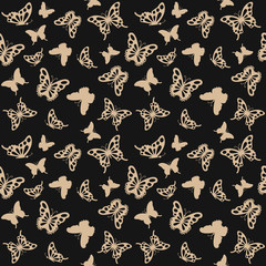 Luxury seamless pattern background with golden filigree butterflies on black.