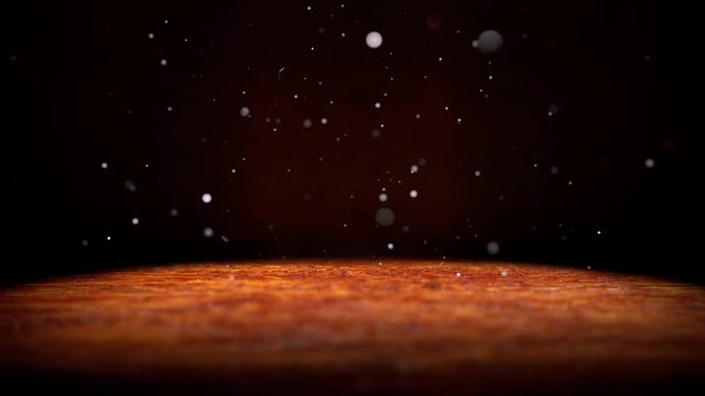 Fondo de suelo de hormig&oacute;n y pared en la oscuridad.Luz de foco y polvo en el ambiente