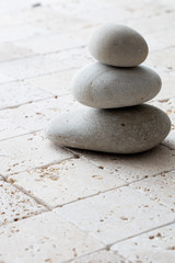 Fototapeta na wymiar mindfulness, detox and relaxation with stack of balancing stones