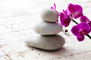 Fototapeta na wymiar symbol of mindfulness, meditation and elegance with flowers and stones