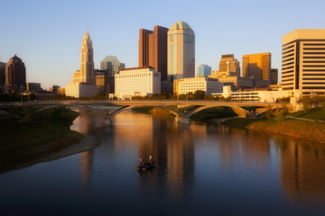 Fototapeta na wymiar Fishing boat on the Scioto River in Columbus, Ohio