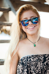 Fototapeta na wymiar Happy woman with sunglasses 