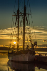 Morning Sun over sailing ship