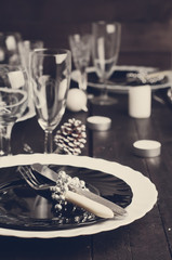 Christmas table setting. Toned photo