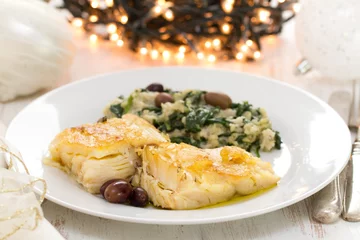 Fotobehang cod fish with vegetables on white plate © Natalia Mylova