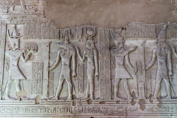 Hieroglyphic carvings on the exterior walls of  egyptian temple