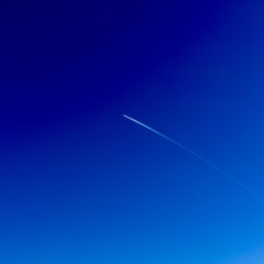 Plane in a blue sky