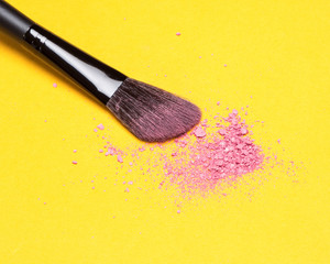 Makeup brush with crushed shimmer blush pink color