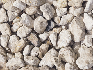 Abstract rough stones background texture macro, selective focus