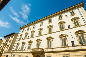 white building under a blue sky in Florence