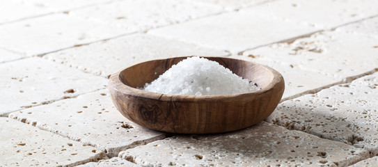 coarse salt in cup for concept of bath or cooking