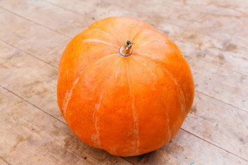 Pumpkin for halloween on wooden background