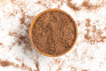 Dry Corn Silk Herb into a bowl. Stigmata Maydis