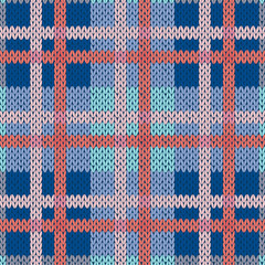 Knitting seamless pattern in blue and pink hues