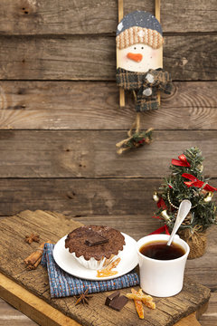 Christmas and New Year still life with chocolate cupcake