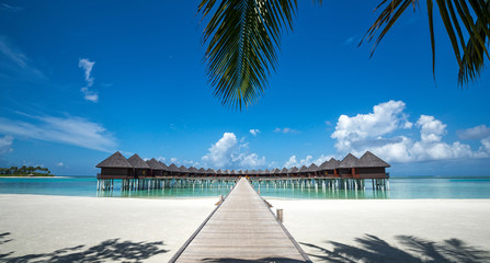 Beautiful beach with water bungalows at Maldives