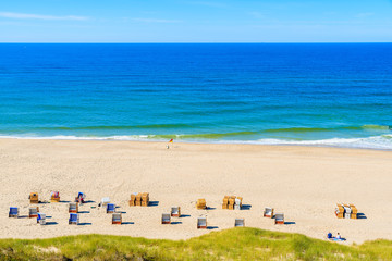 View of beautiful beach with chairs in Wenningstedt, Sylt island, Germany