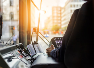 Inside a tram with driver and dashboard in sunset © lstudio