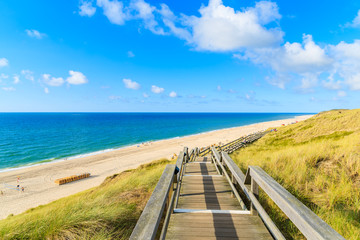 Steps to sandy beach in Wenningstedt, Sylt island, Germany