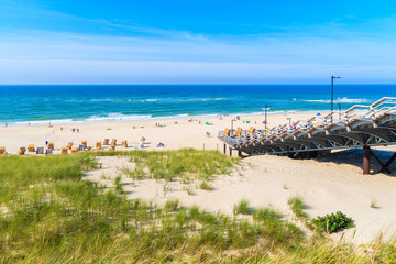 Steps from sand dune to beach in Wenningstedt, Sylt island, Germany