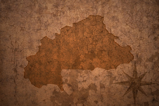 burkina faso map on a old vintage crack paper background