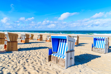 Chairs on beautiful beach in Wenningstedt village, Sylt island, Germany