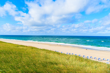 View of beautiful beach from sand dune near Westerland village, Sylt island, Germany