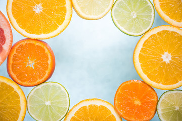Citrus fruits frame background
