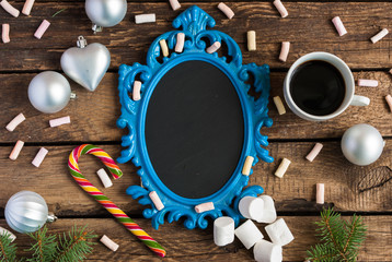 Christmas wooden background with blue frame