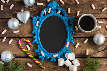 Christmas wooden background with blue frame