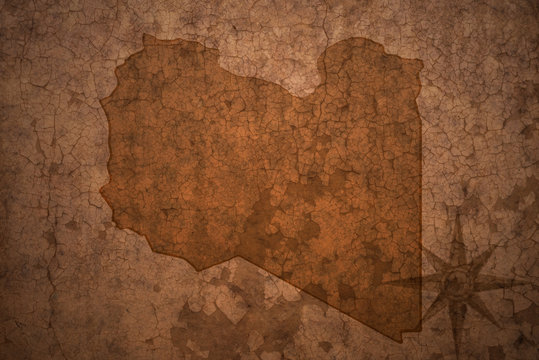 libya map on a old vintage crack paper background