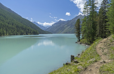 Naklejka na ściany i meble The trail runs along the shore of the Kucherla lake. Altai Mount