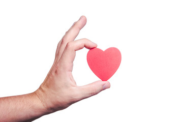 Male hand holding red wooden heart shape background.