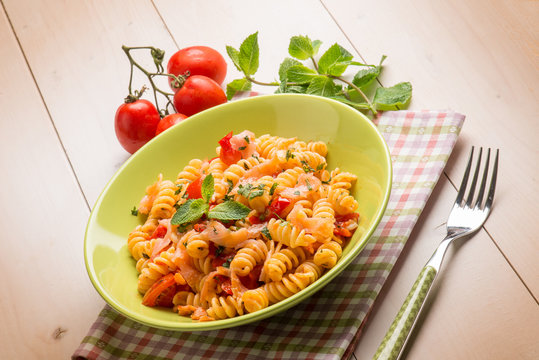 pasta with fresh salmon  tomatoes and mint