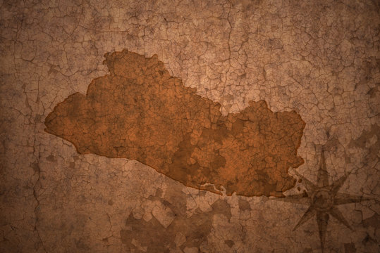 el salvador map on a old vintage crack paper background