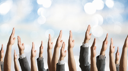 Fototapeta premium Group of people with raised hands