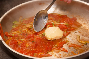 Vegetables for the sauce to pasta fried in a pan.